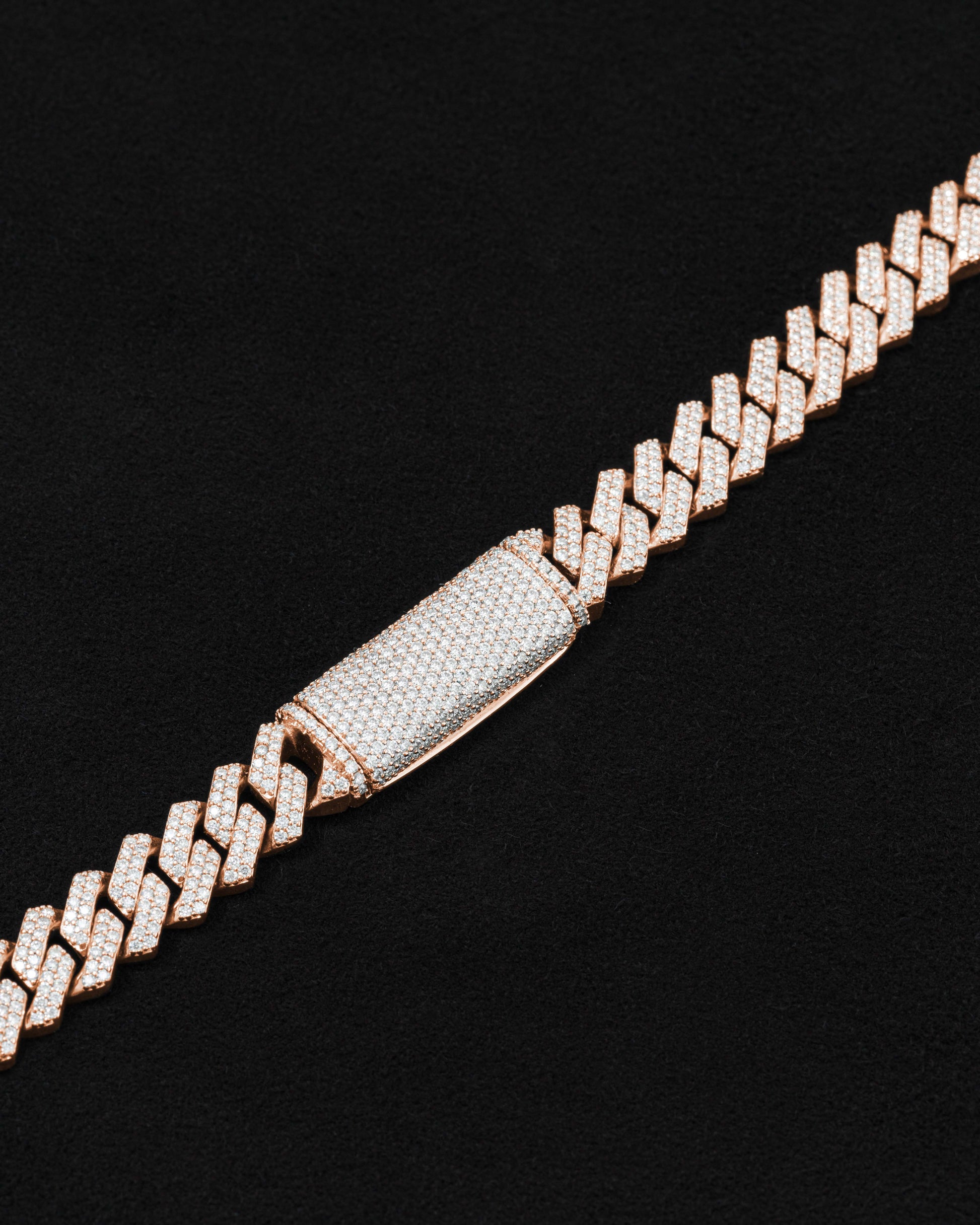 detail of 18 carats rose solid gold and silver bracelet with natural diamonds and moissanite diamonds