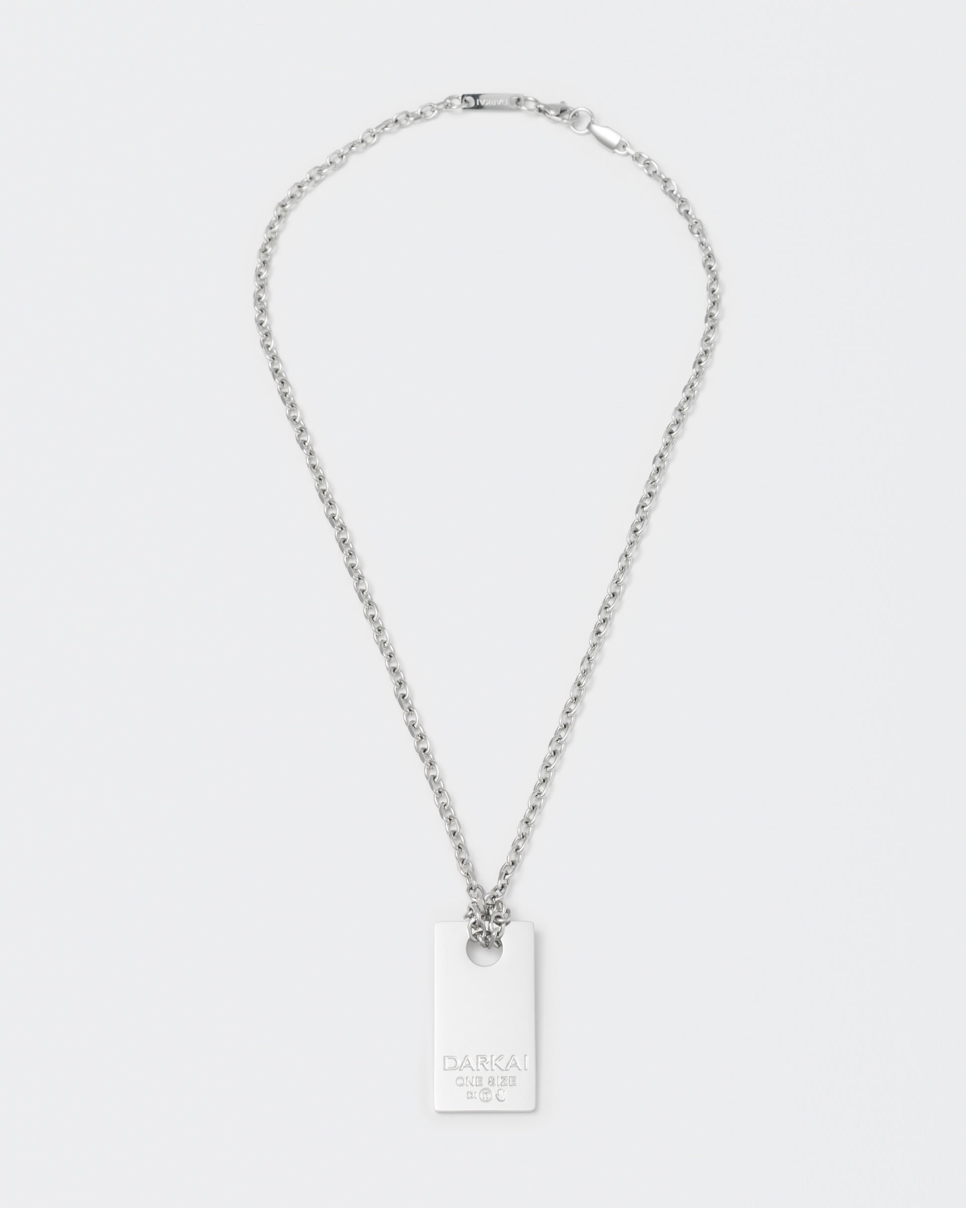 size tag pendant necklace with 18kt white gold coating with lasered logo and details. 2mm cable chain and lobster clasp with metal logo tag.