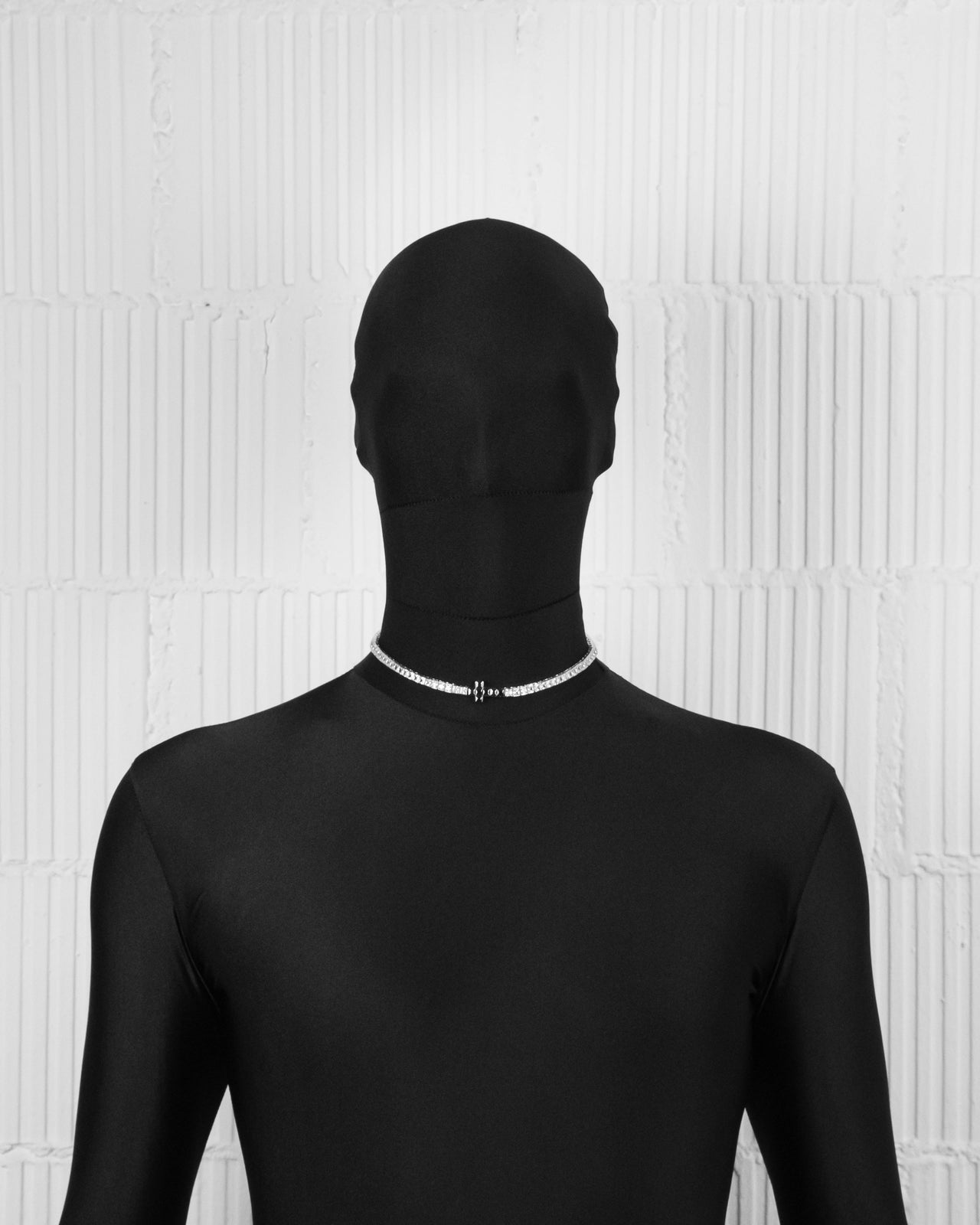 18k white gold and black coated tennis chain necklace with contrasting cross element and hand-set princess-cut stones in white and black