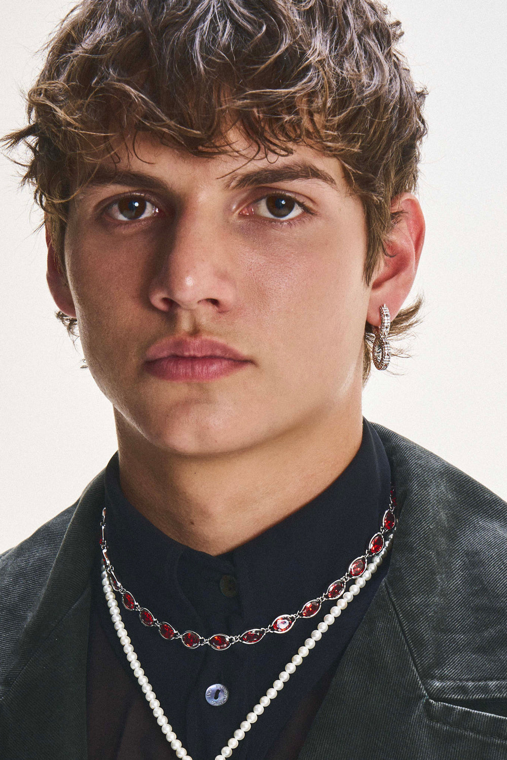 DARKAI Spiked Infinity Earrings on Male Model