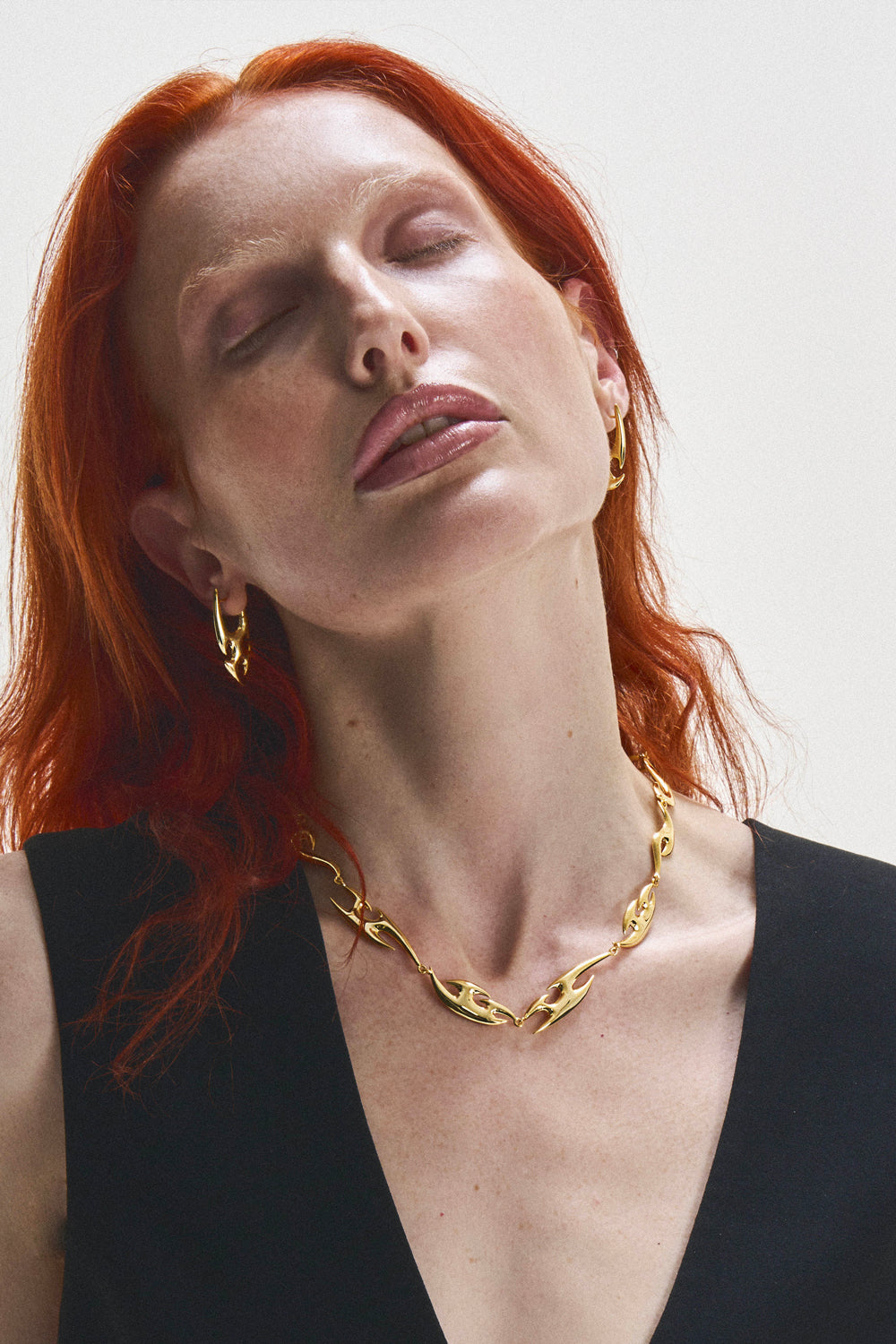 DARKAI Tribal Gold Necklace On Female Model
