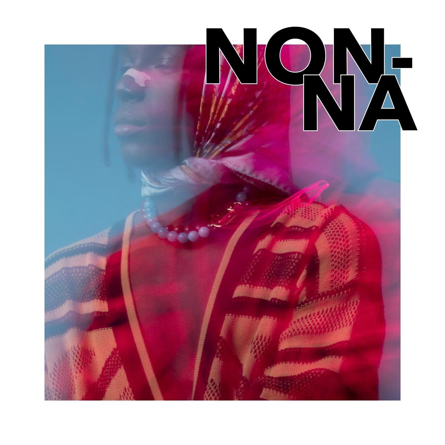 DARKAI 90s Kids Lookbook FW23 Man wearing nonna necklace with aquamarine spheres