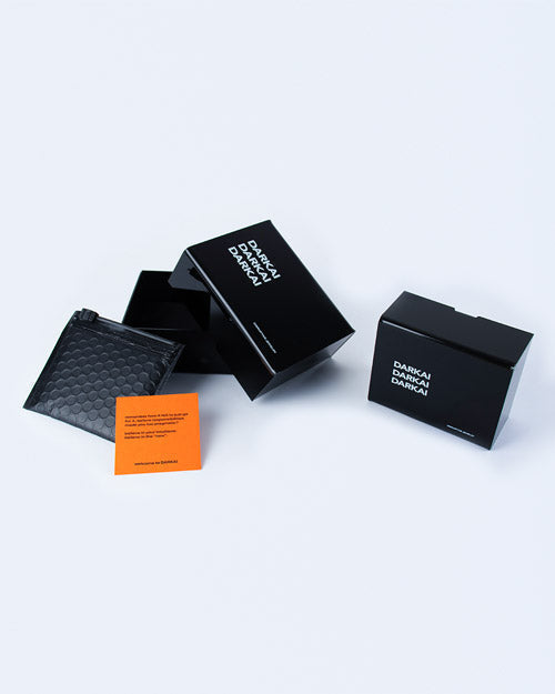 DARKAI recycled packaging in black