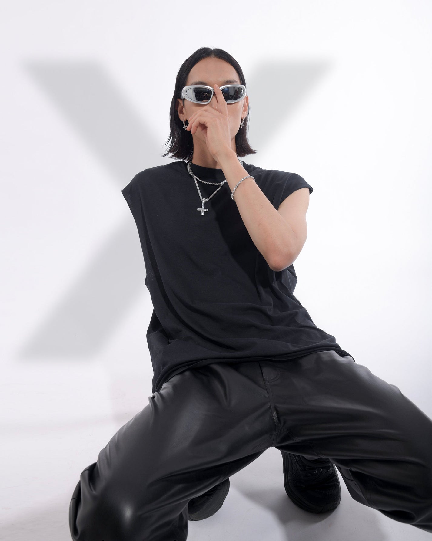 Men wearing DARKAI reversed cross set