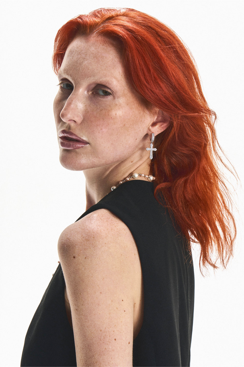DARKAI Cross Earrings on Female Model
