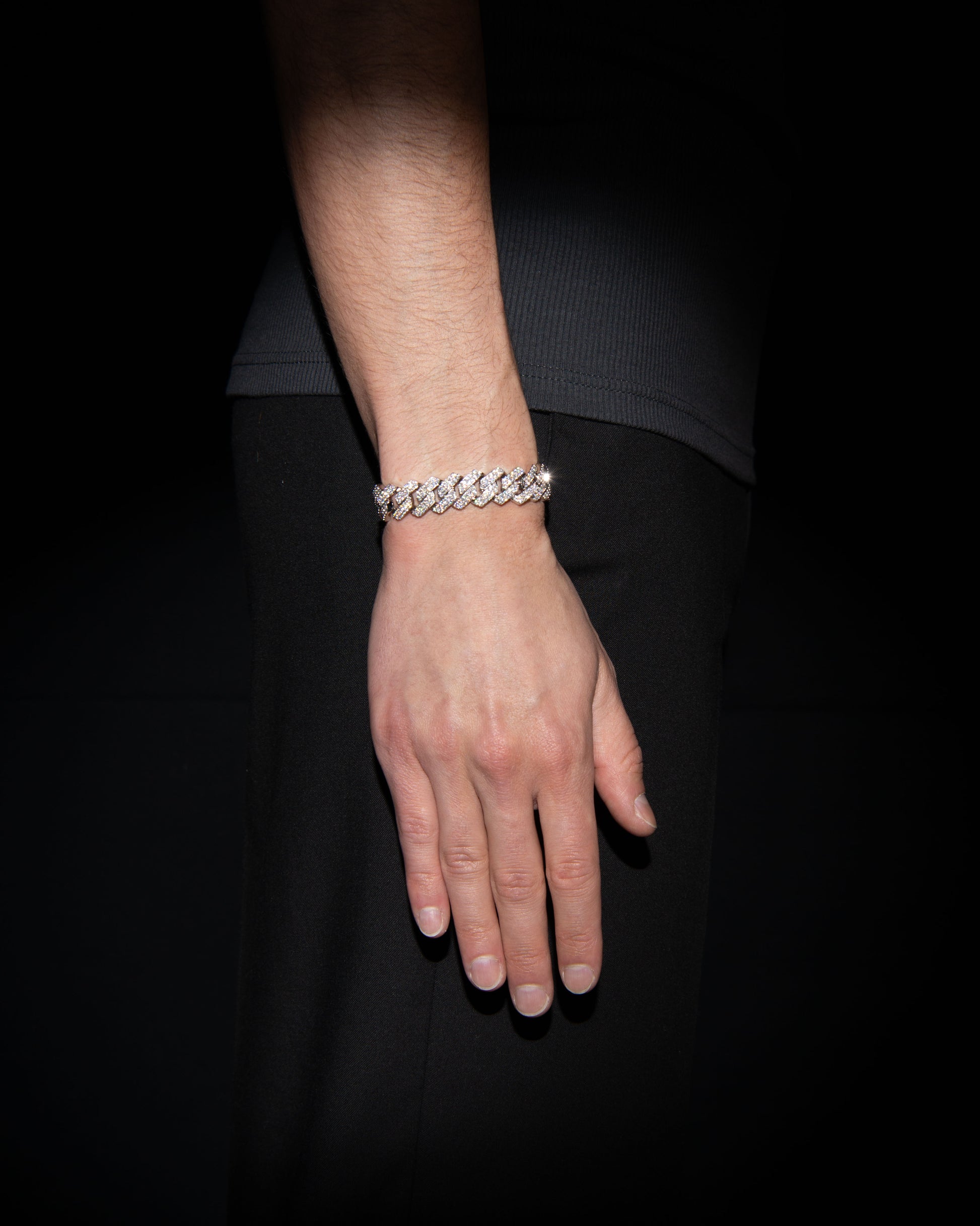 man wearing 18 carats white solid gold and silver bracelet with natural diamonds and moissanite diamonds