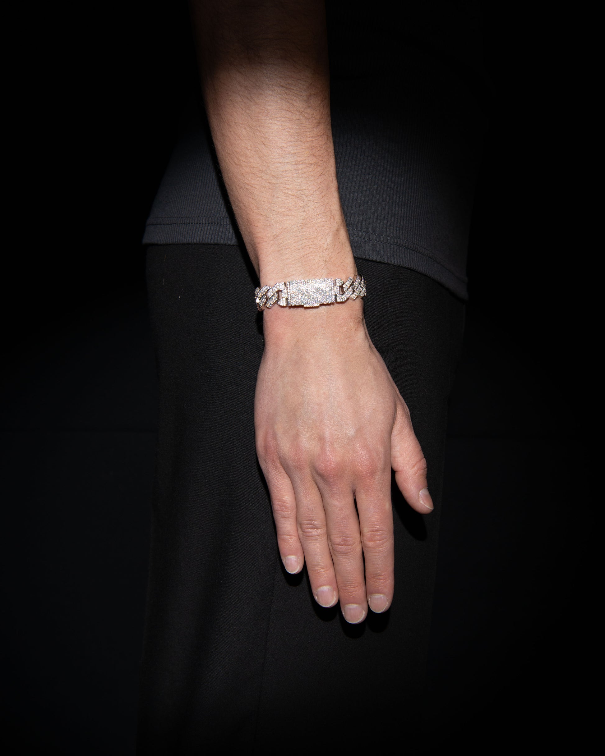 man wearing 18 carats white solid gold and silver bracelet with natural diamonds and moissanite diamonds