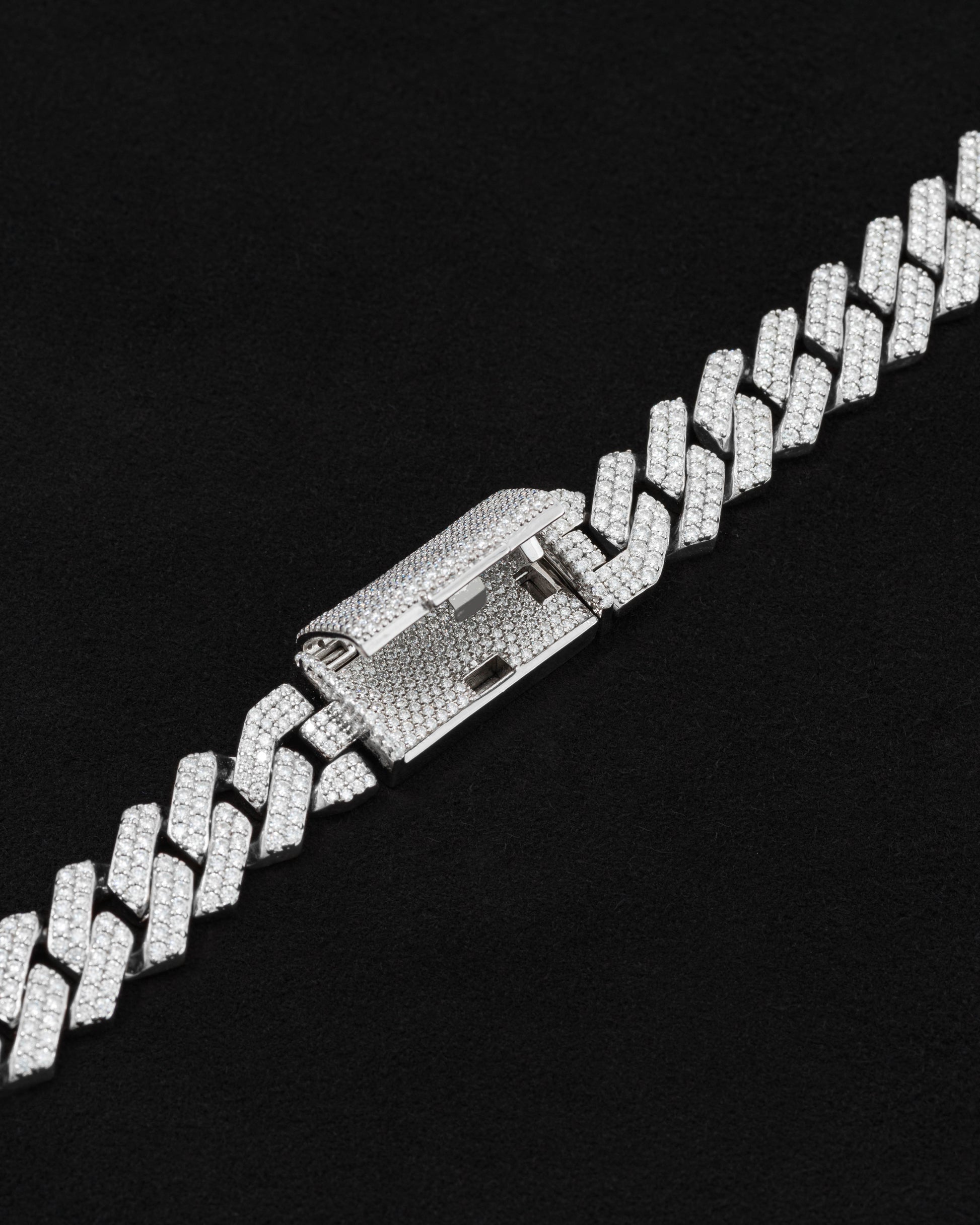 detail of 18 carats white solid gold and silver bracelet with natural diamonds and moissanite diamonds