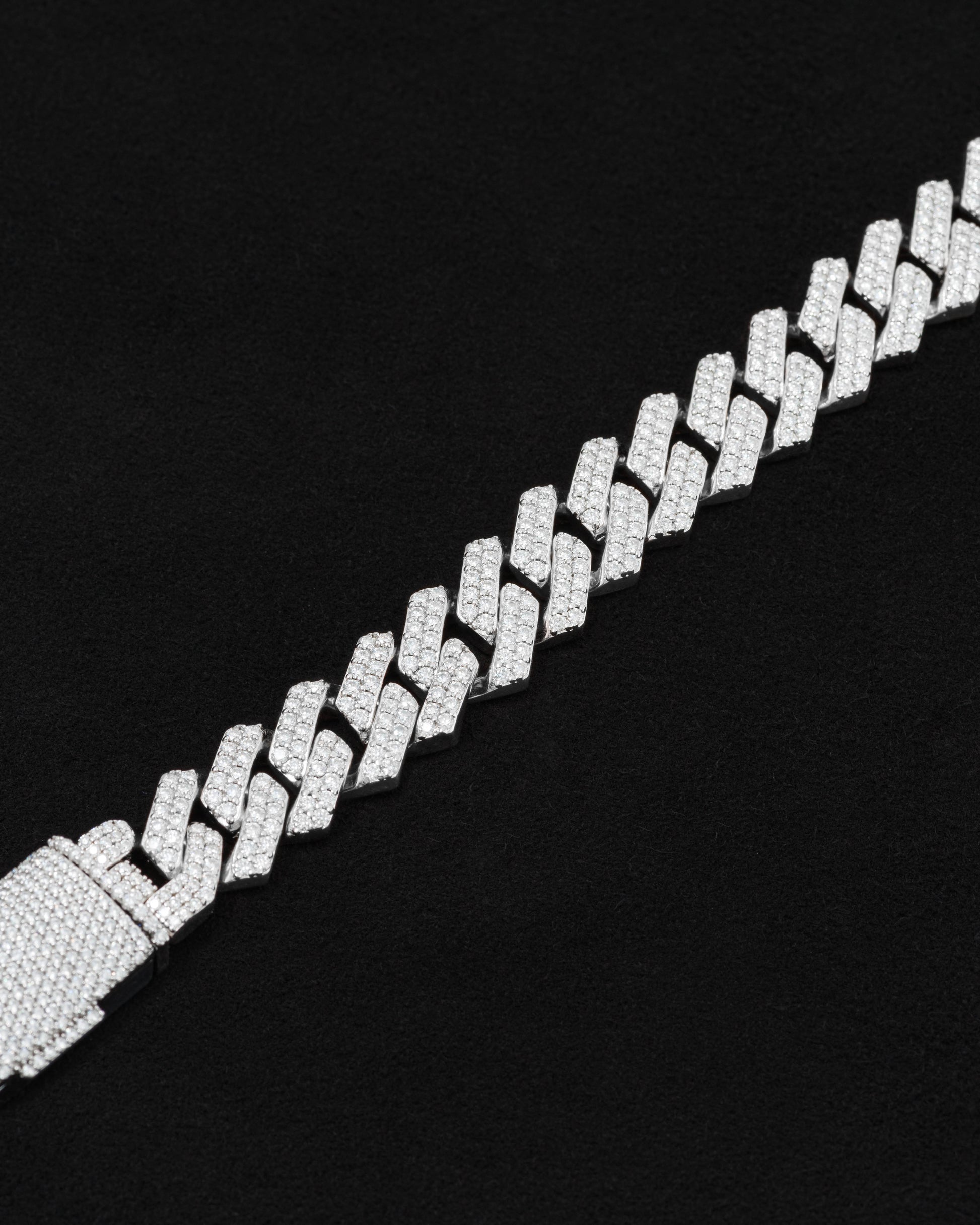 detail of 18 carats white solid gold and silver bracelet with natural diamonds and moissanite diamonds