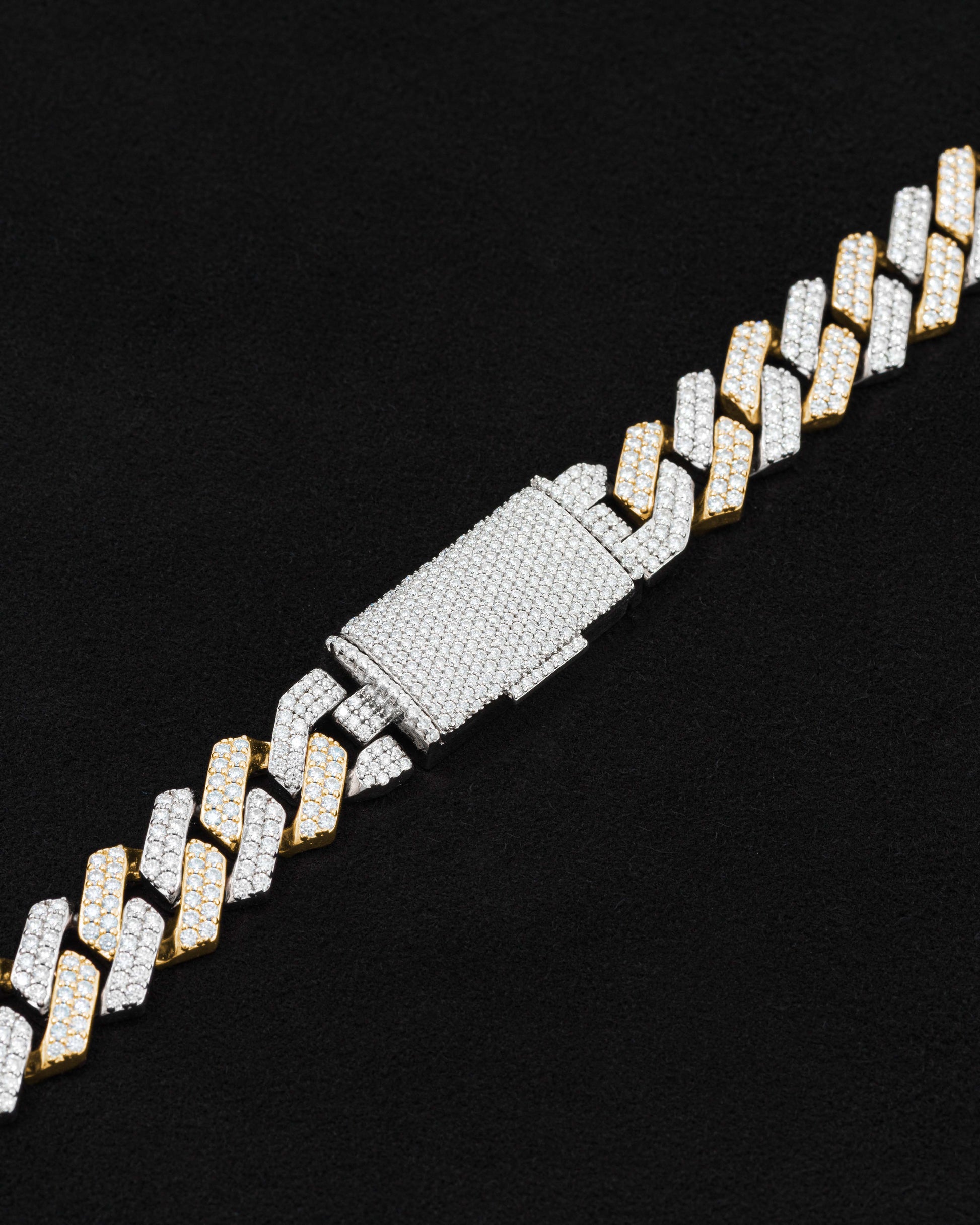 detail of 18 carats white and yellow solid gold and silver bracelet with natural diamonds and moissanite diamonds