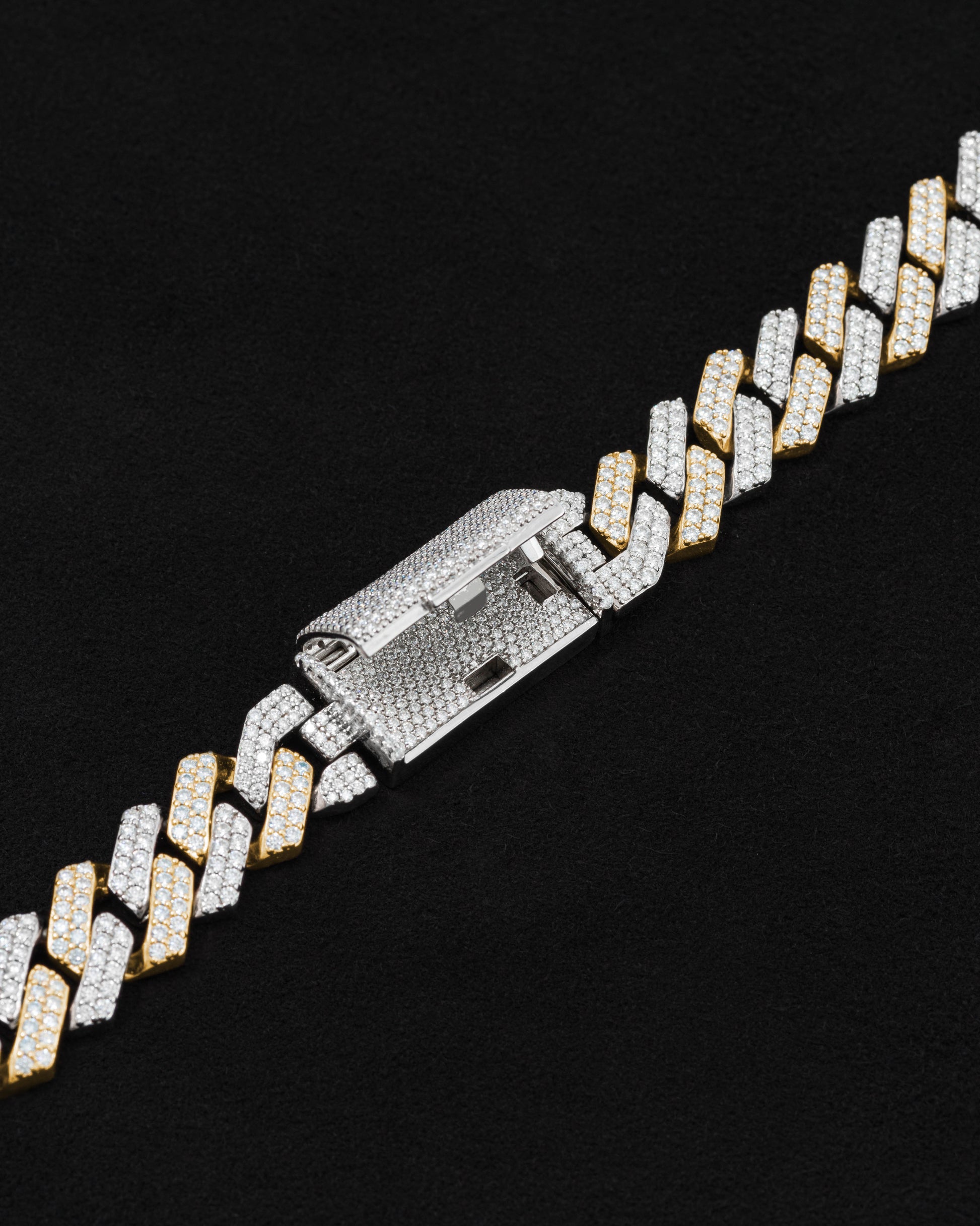 detail of 18 carats white and yellow solid gold and silver bracelet with natural diamonds and moissanite diamonds