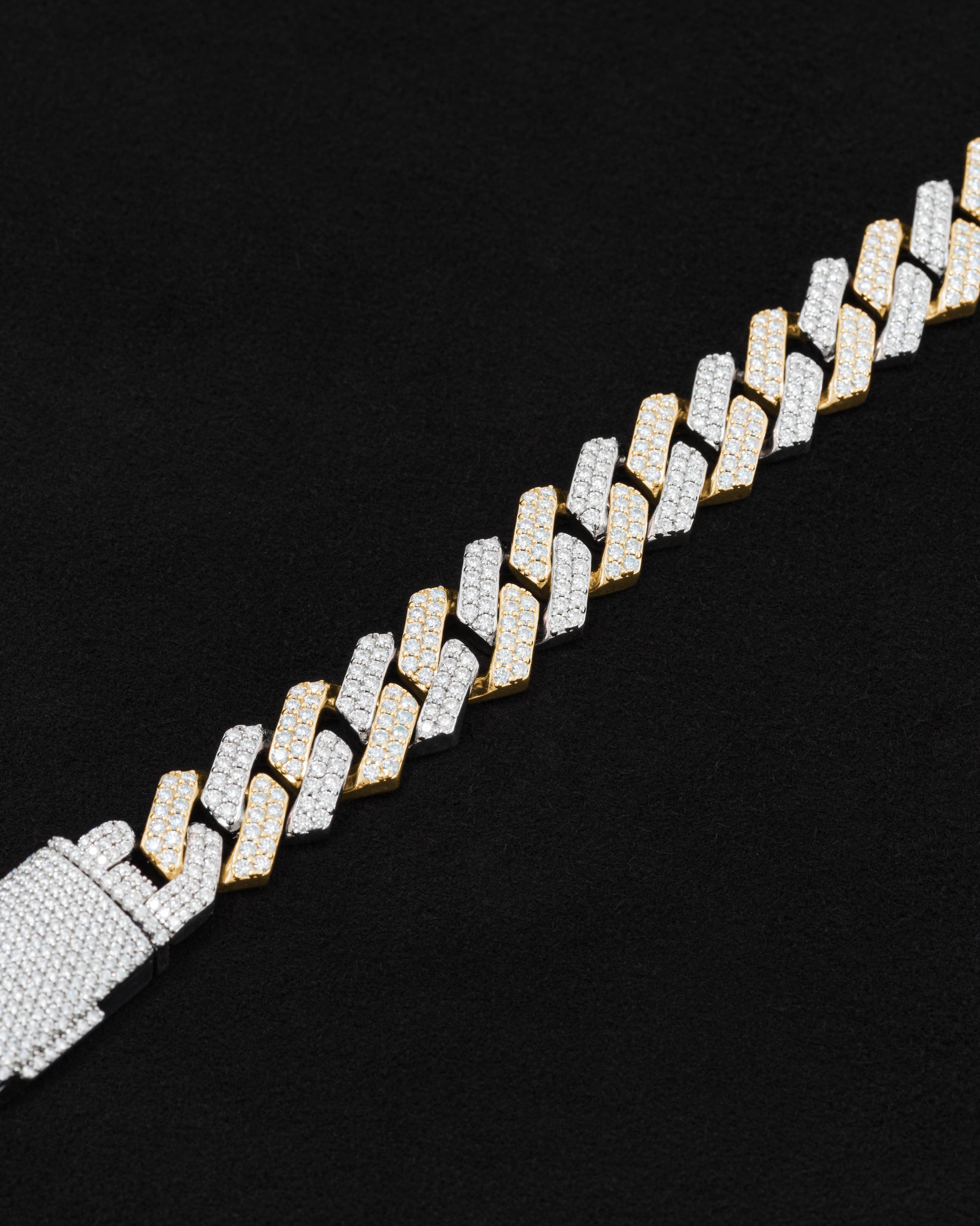 detail of 18 carats white and yellow solid gold and silver bracelet with natural diamonds and moissanite diamonds