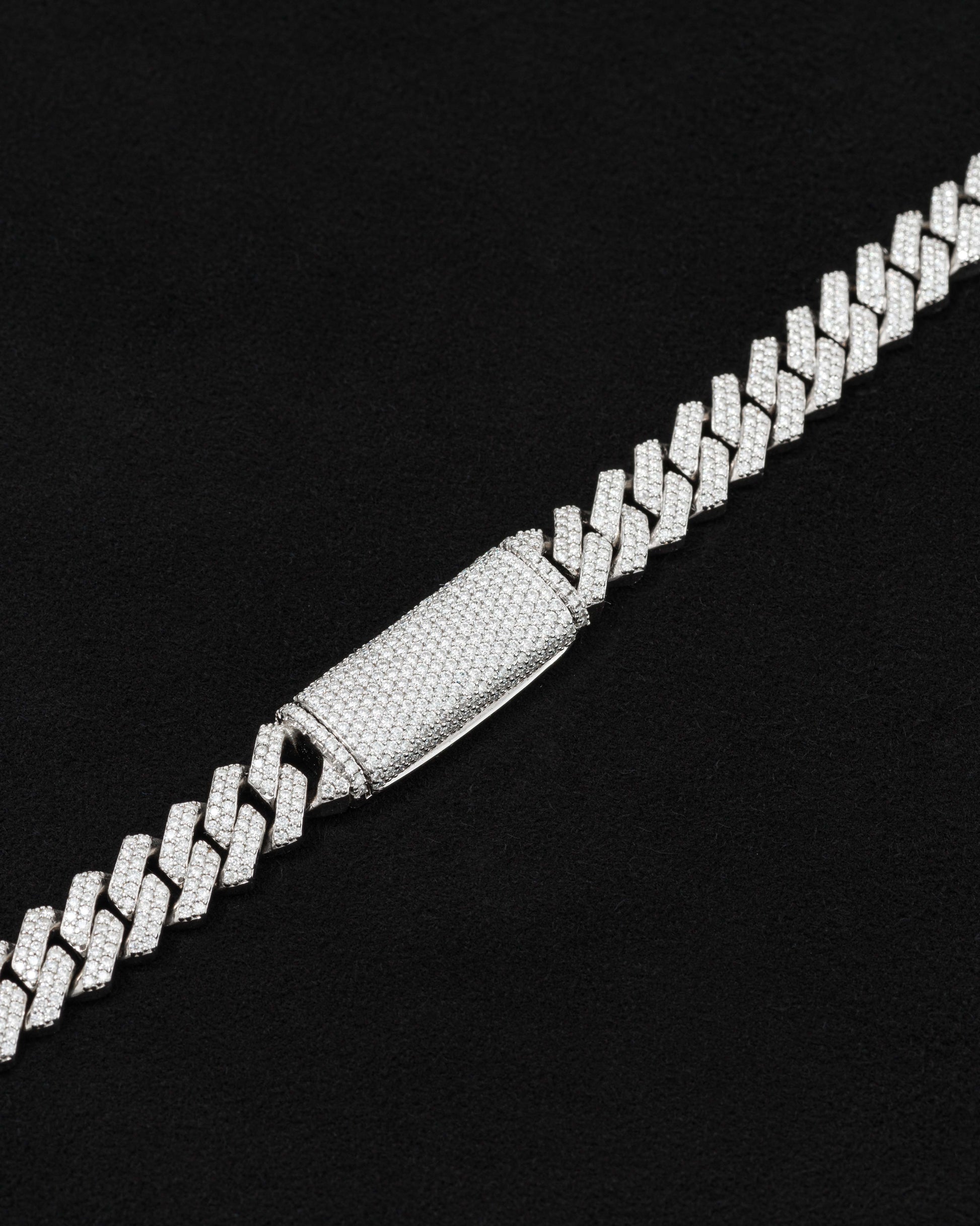 detail of 18 carats white solid gold and silver bracelet with natural diamonds and moissanite diamonds