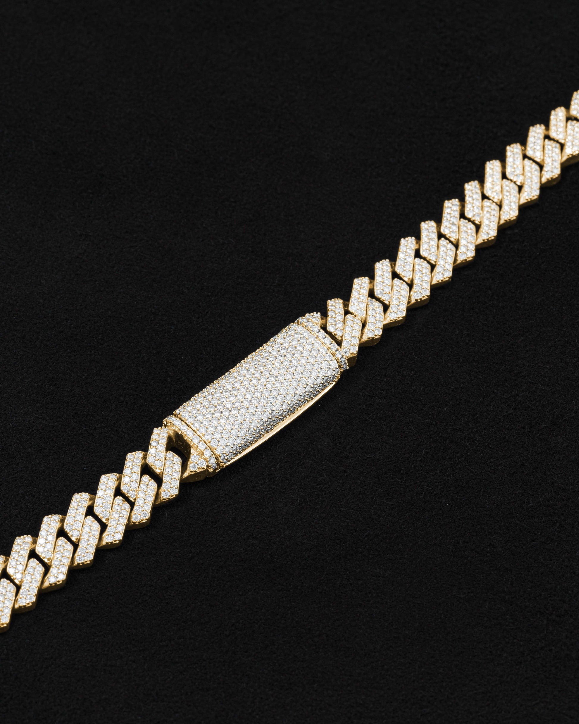 detail of 18 carats yellow solid gold and silver bracelet with natural diamonds and moissanite diamonds