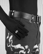 man with black suit wearing stainless steel white ring with stores