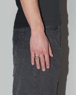 street style man wearing white octagonal ring with stone