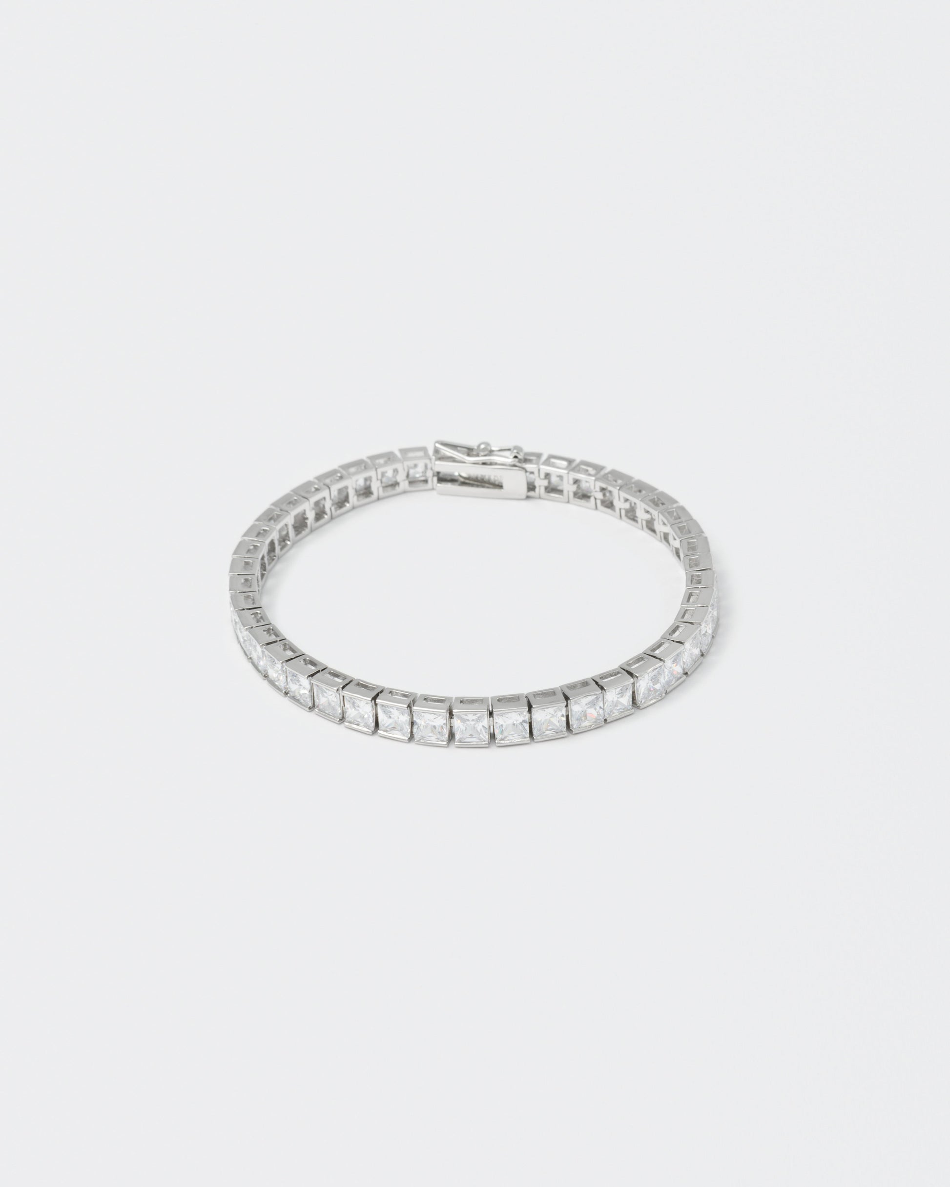 18k white gold coated tennis chain bracelet with white hand-set princess-cut stones