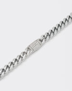detail of 18k white gold coated cuban chain bracelet with hand-set micropavé stones in white