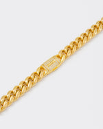 detail of 18k yellow gold coated cuban chain bracelet with hand-set micropavé stones in white