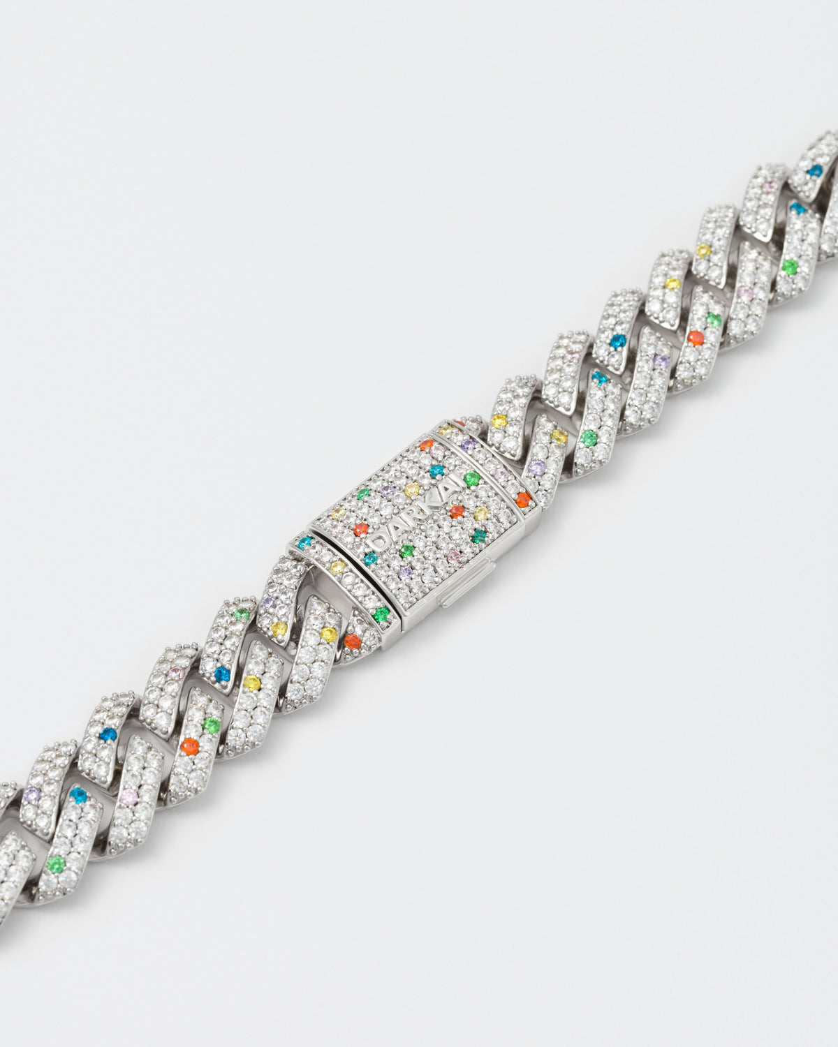 detail of the bracelet clasp with hand-set micropavé stones in white, violet, orange red, green, golden yellow and topaz blue