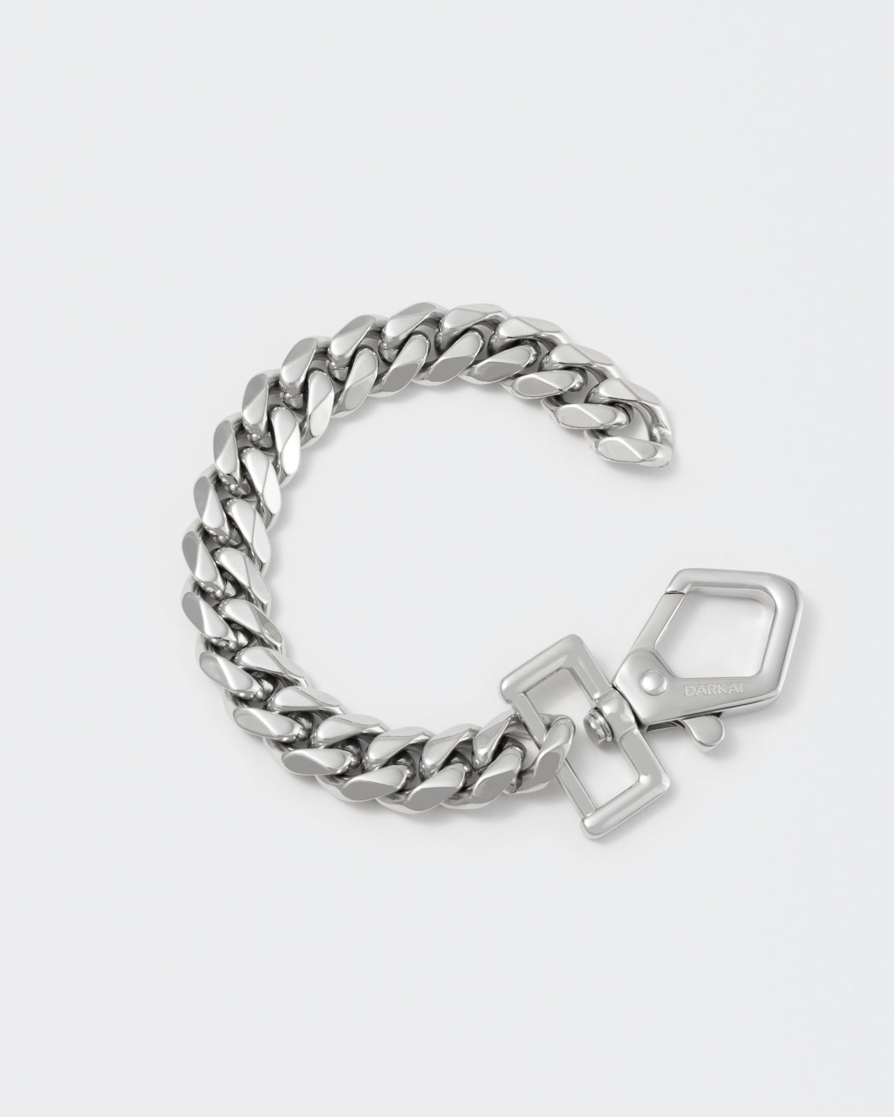 Cutting edge cuban chain bracelet with 18kt white gold coating and oversize carabiner clasp with engraved logo