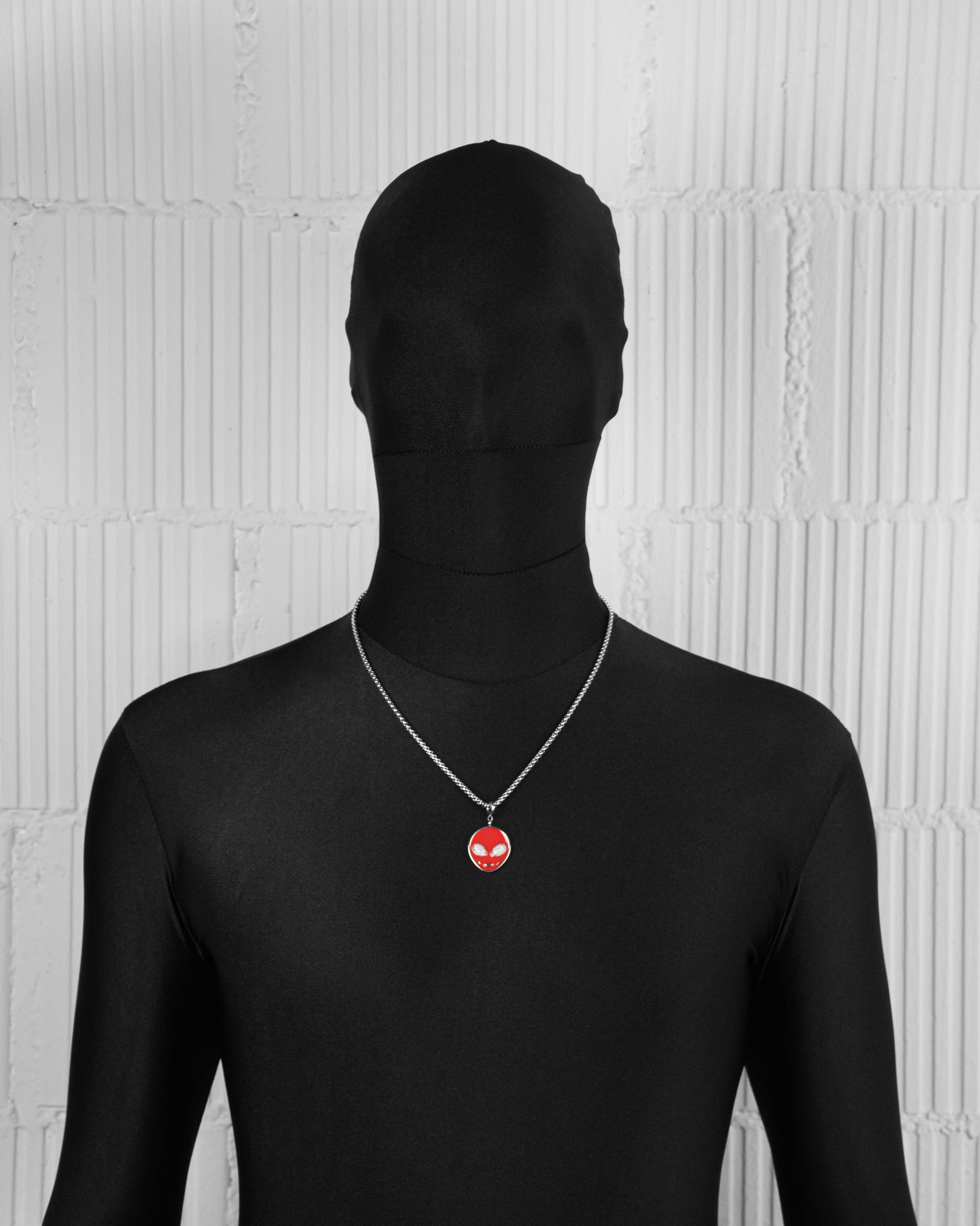 18k white gold coated alien pendant necklace with hand-set micropavé stones in white on red hand painted glow in the dark alien pendant and 3mm rolo chain