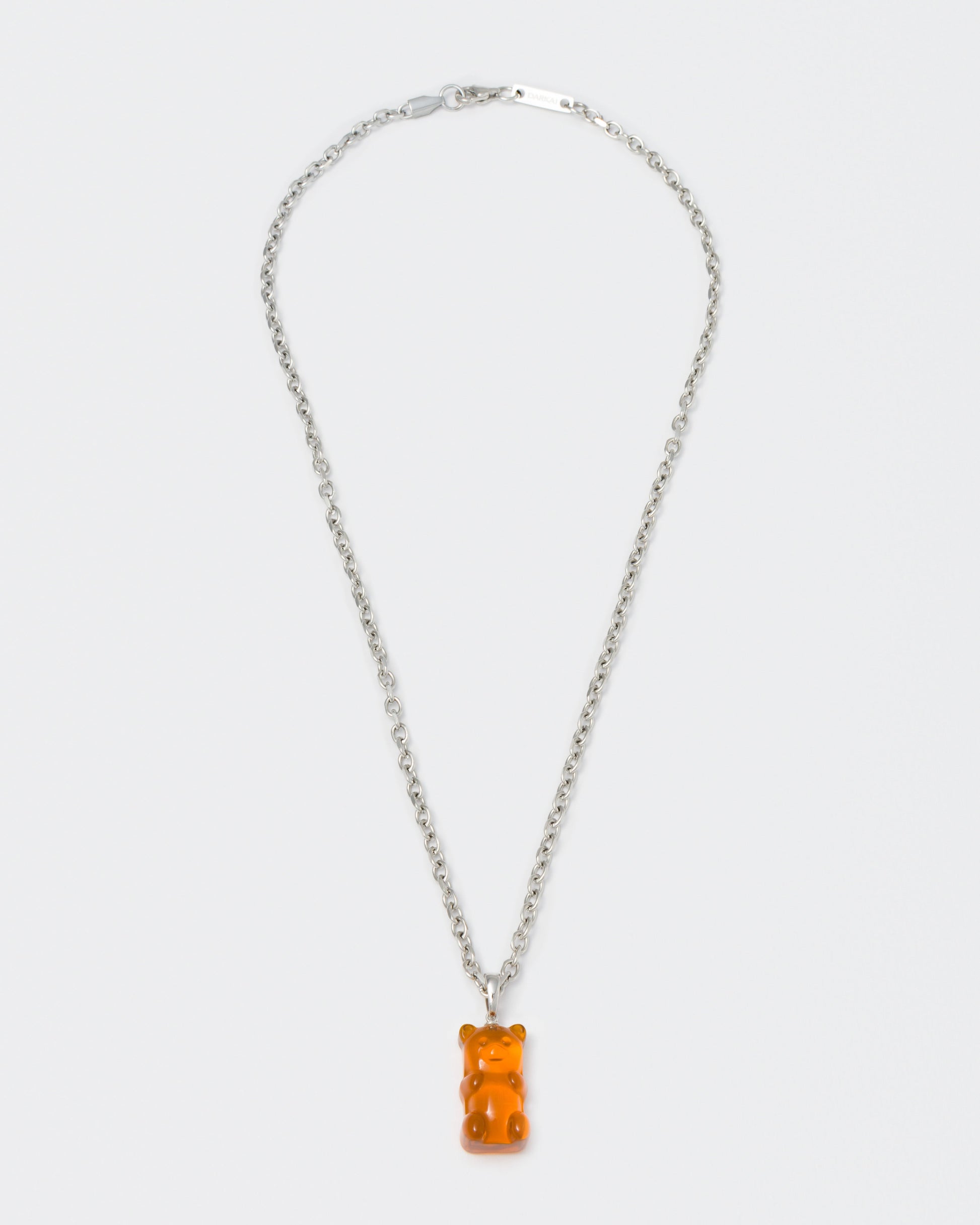 18k white gold coated gummy bear pendant necklace with 3D cut clear crystal in orange and 3mm rolo chain