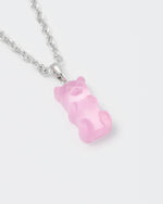 detail of 18k white gold coated gummy bear pendant necklace with 3D cut sandblasted crystal in pink and 3mm rolo chain