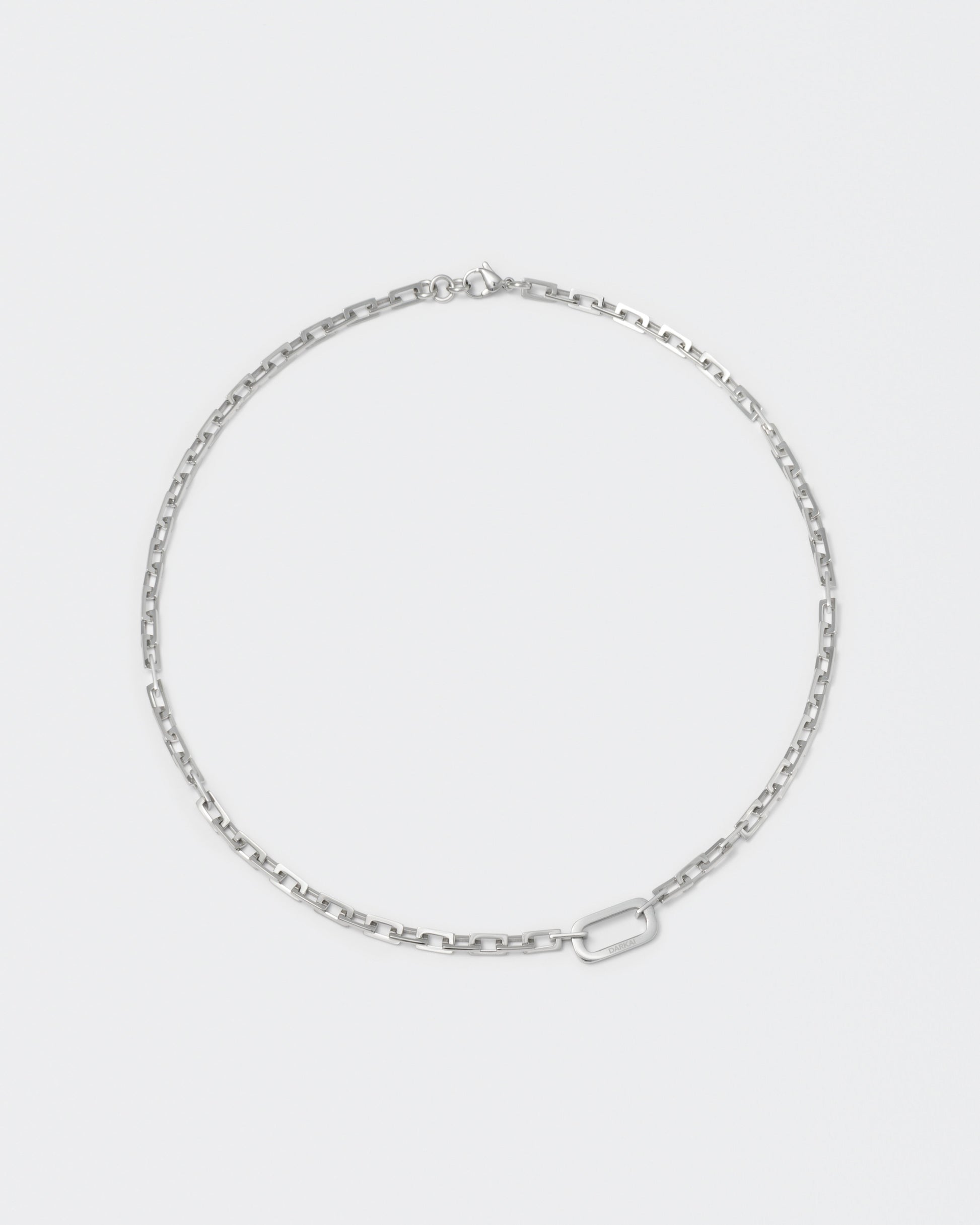 18k white gold coated edgy diamond finished rolo chain necklace with central oval link detail and lobster clasp with logo