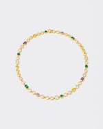 18k yellow gold coated mixed bezels chain necklace with hand-set stones in different shapes and colors. Mix of rectangular, square, round and heart-shaped stones in white, amethyst, emerald green and gold yellow