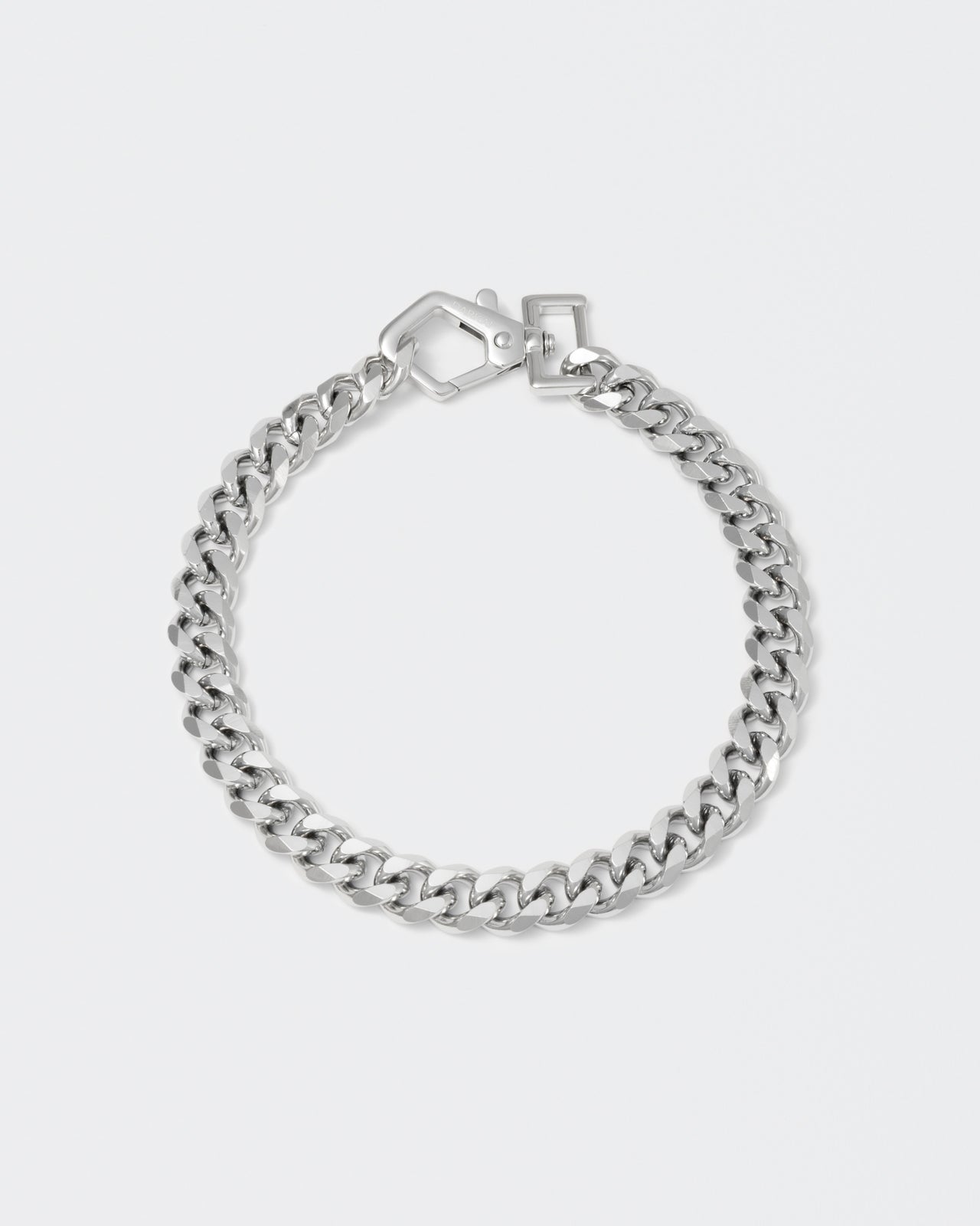 Cutting edge cuban chain choker with 18kt white gold coating and oversize carabiner clasp with engraved logo