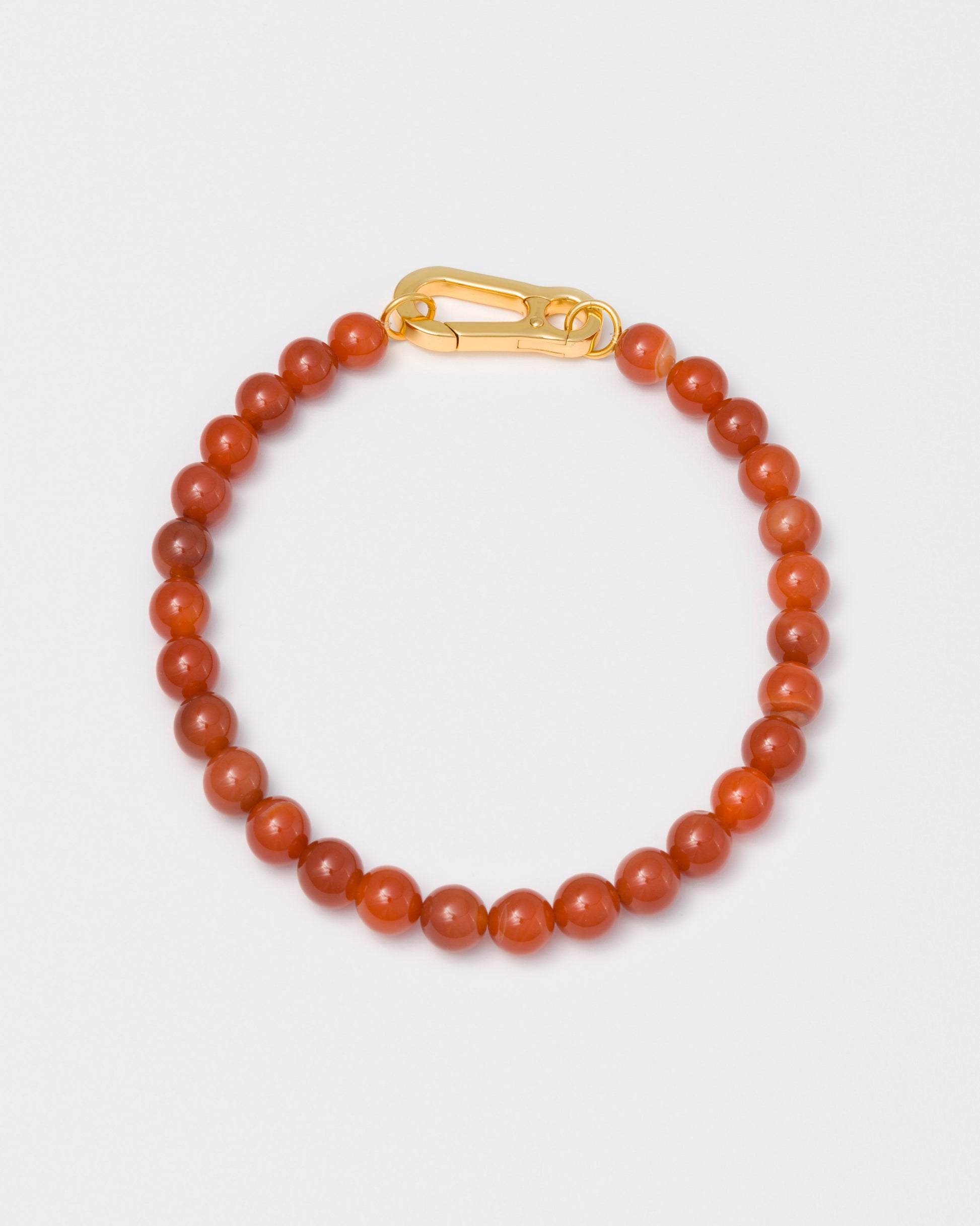 Amber stones necklace with 18k yellow gold coated lasered logo oversize carabiner clasp.