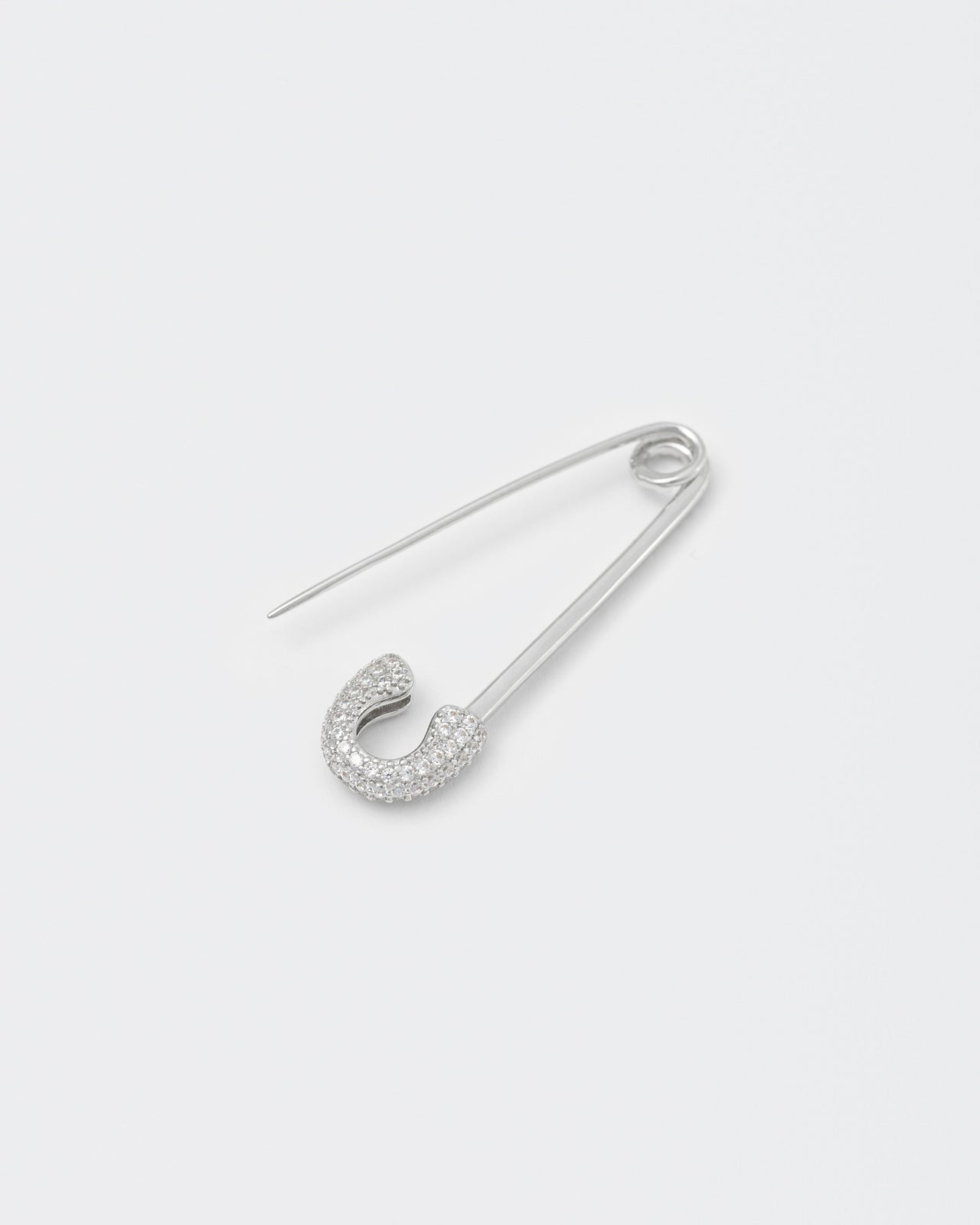 18k white gold coated safety pin mono earring with all-around hand-set micropavé stones in white