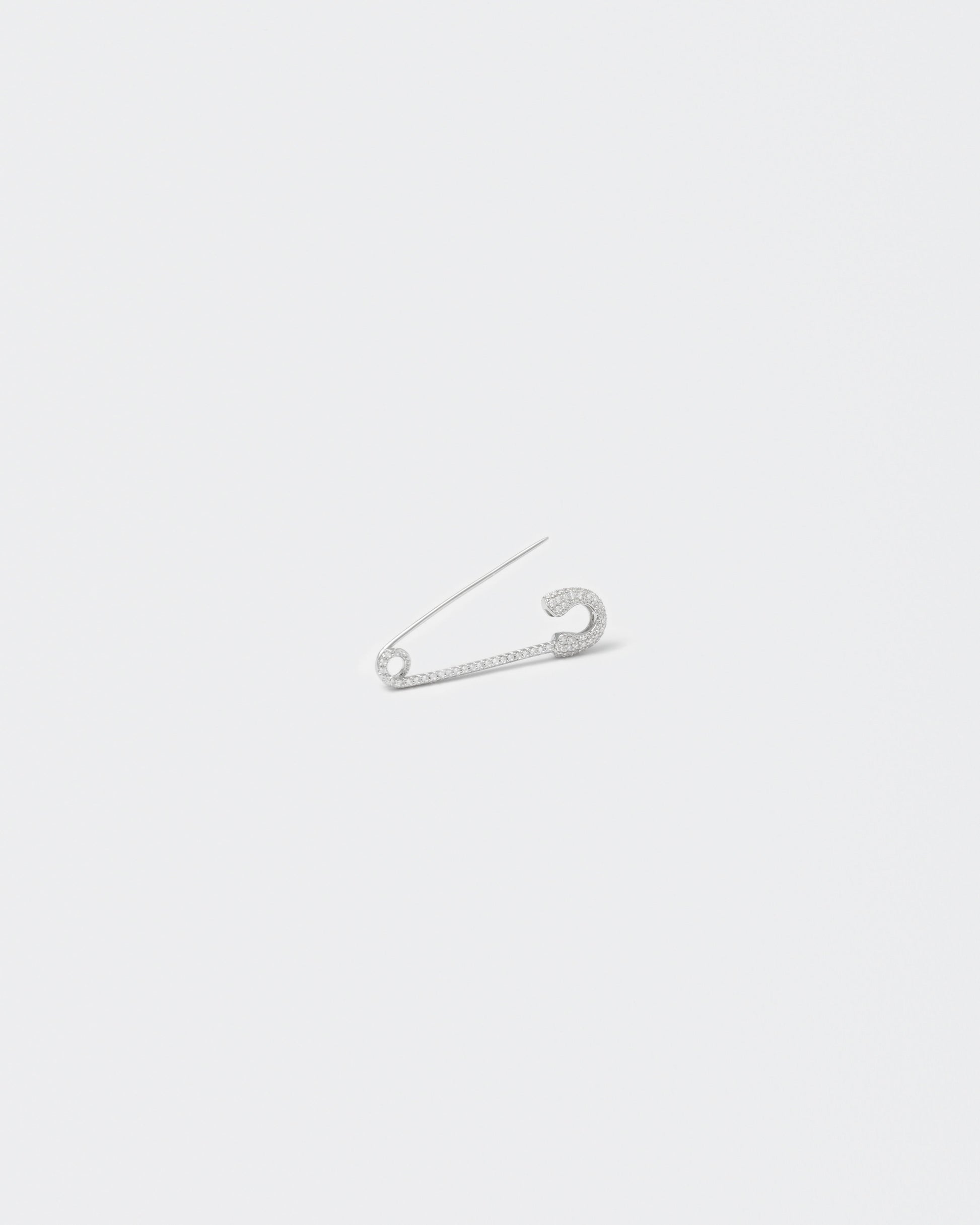 18k white gold coated safety pin mono earring with all-around hand-set micropavé stones in white