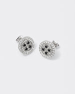 detail of button earrings with 18kt white gold coating and hand-set micropavé in diamond white and black stones. 925 silver pin, metal realistic details and logo engraved on the back
